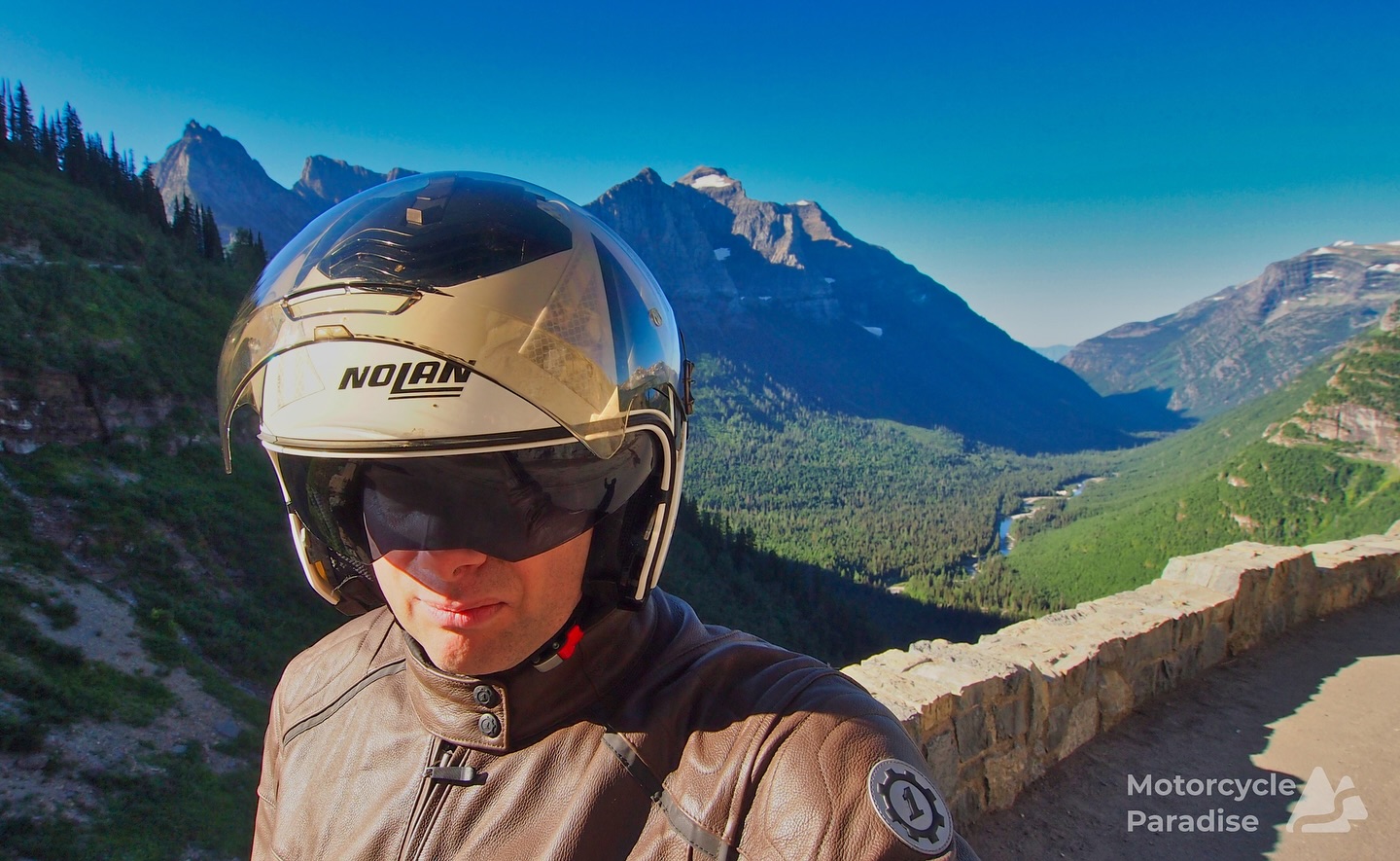 Despite not smiling I was blown away by the amazing scenery on my 2012 North American ride. Can’t believe I toured in a leather jacket. 😅 #goingtothesunroad #glaciernationalpark #montana #motorcycletouring #motorcycletrip #motorcycletravel #motorcycleadventure #mototouring #soloride #adventurerider
